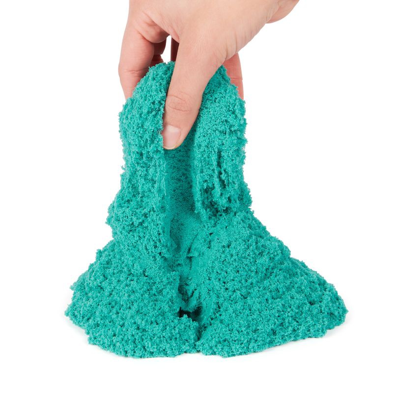 Kinetic Sand forma castello con sabbia liquida